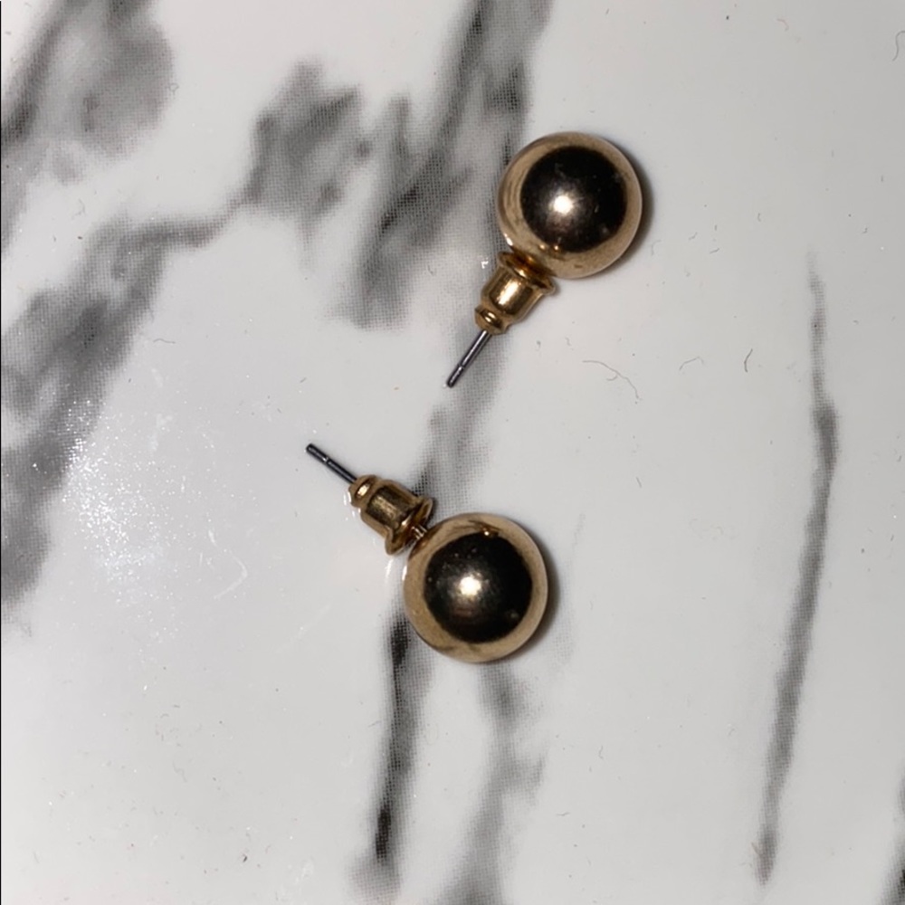 Coach Bracelet and Gold Earrings.
